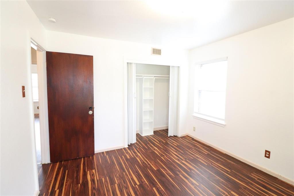 9107 Rustown Drive Dallas, TX 75228 - Photo 15 of 30 a view of bedroom with wooden floor