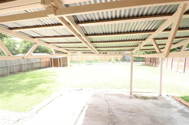 a view of a porch with a yard