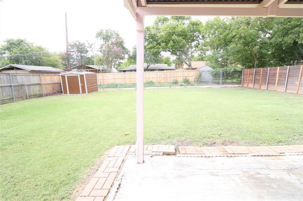 9107 Rustown Drive Dallas, TX 75228 - Photo 24 of 30 a view of a porch with a yard