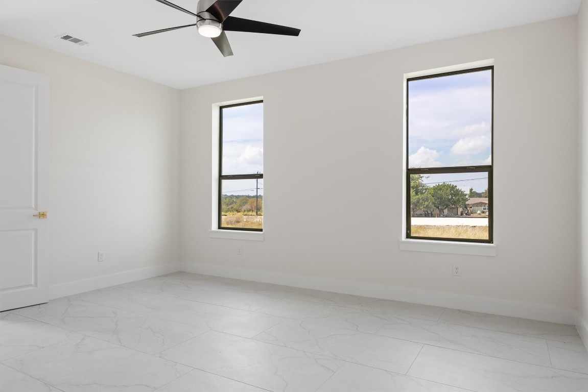 109 Fall Drive Georgetown, TX 78633 - Photo 18 of 40 a view of an empty room with a window