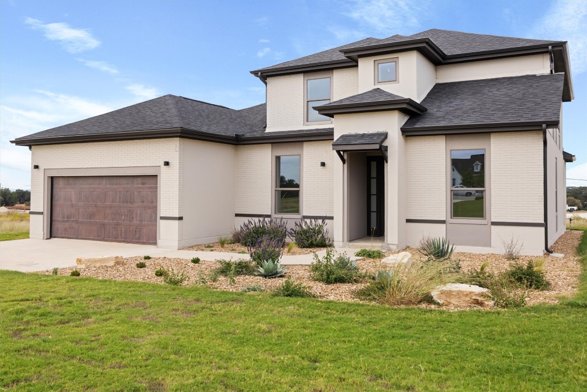 109 Fall Drive Georgetown, TX 78633 - Photo 2 of 40 a front view of a house with a yard
