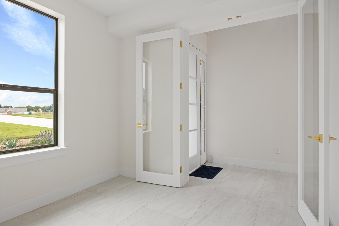 109 Fall Drive Georgetown, TX 78633 - Photo 3 of 40 a view of an empty room with a window