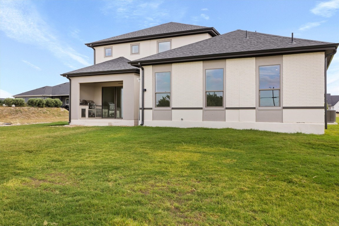 109 Fall Drive Georgetown, TX 78633 - Photo 36 of 40 a view of a house with a yard