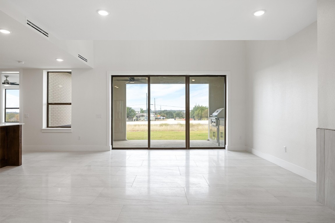 109 Fall Drive Georgetown, TX 78633 - Photo 8 of 40 a view of an empty room with a window