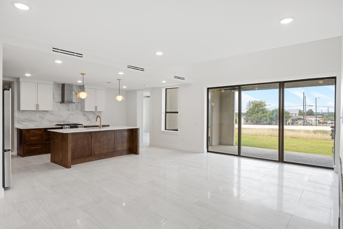 109 Fall Drive Georgetown, TX 78633 - Photo 10 of 40 a large bathroom with a large tub and large windows