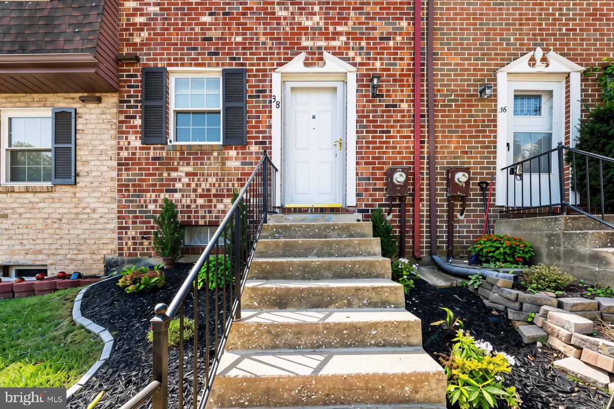 38 Ritters Ridge Court, Unit 38 Owings Mills, MD 21117 - Photo 2 of 36 Brick townhome with beautiful landscaping