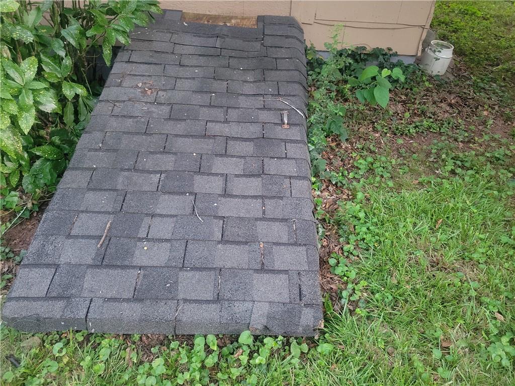 1767 Thomas Street Decatur, GA 30032 - Photo 21 of 24 a brick building with a yard