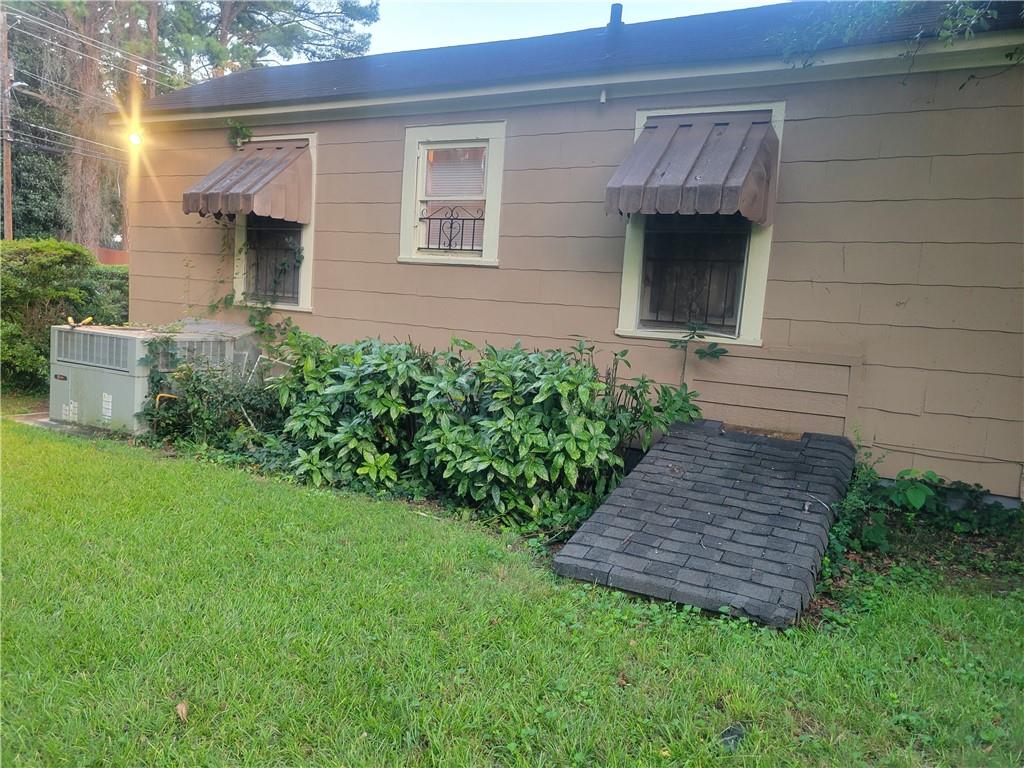 1767 Thomas Street Decatur, GA 30032 - Photo 6 of 24 a front view of a house with garden