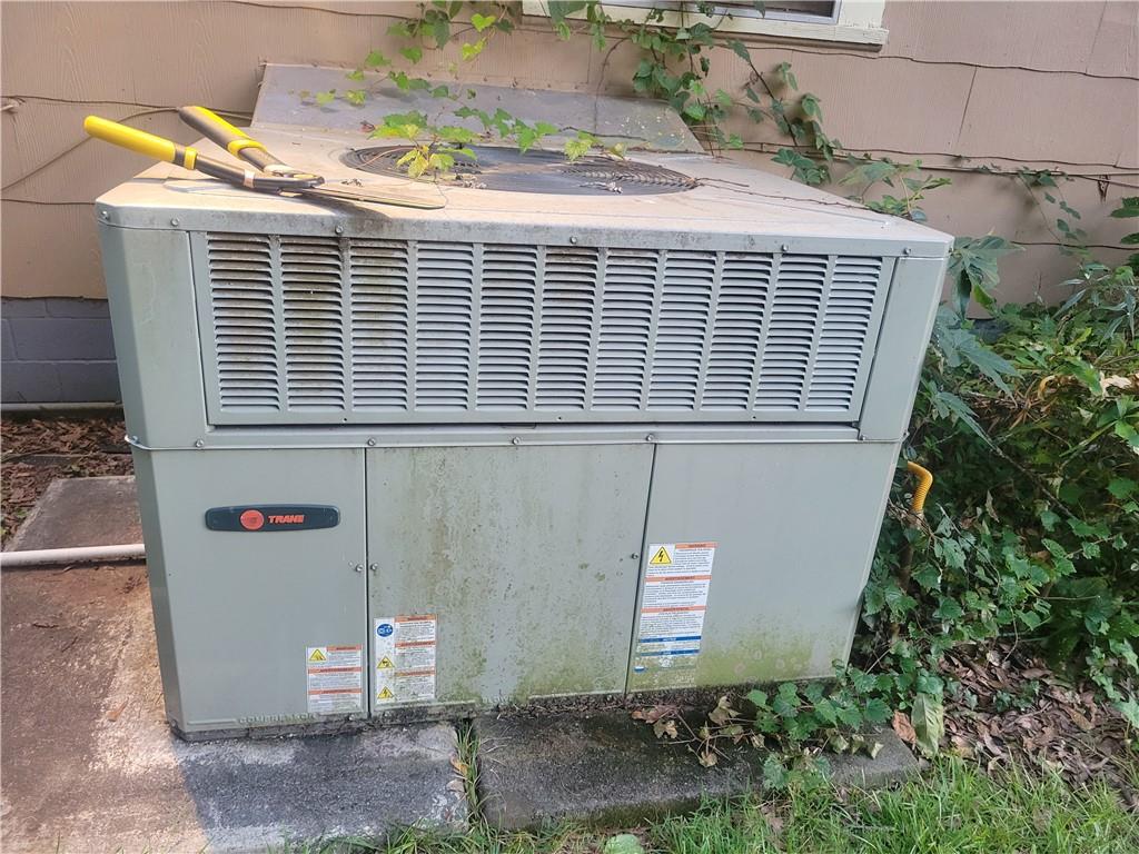1767 Thomas Street Decatur, GA 30032 - Photo 10 of 24 a front view of a house with a yard