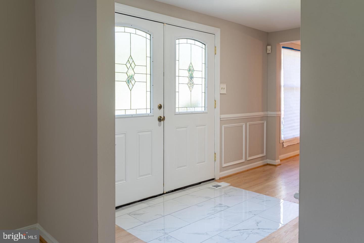 14913 Lear Lane Silver Spring, MD 20905 - Photo 2 of 33 Inviting entryway with elegant doors.