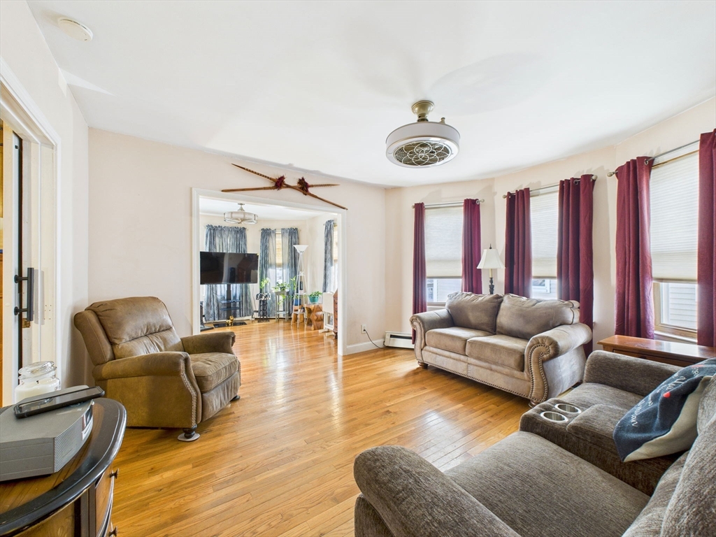 371 Reed Street New Bedford, MA 02740 - Photo 25 of 42 a living room with furniture and a large window
