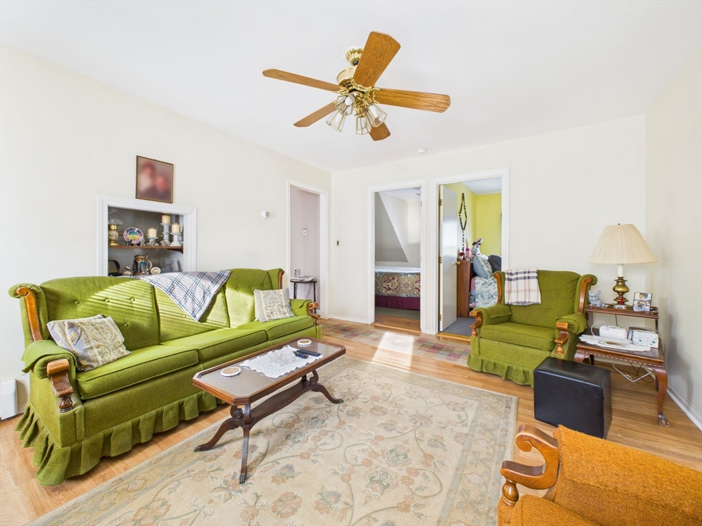 371 Reed Street New Bedford, MA 02740 - Photo 36 of 42 a living room with furniture and a table