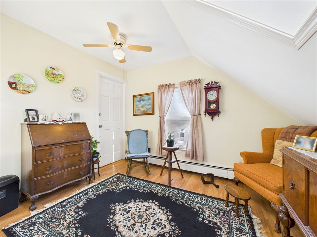 371 Reed Street New Bedford, MA 02740 - Photo 42 of 42 a living room with furniture and a rug