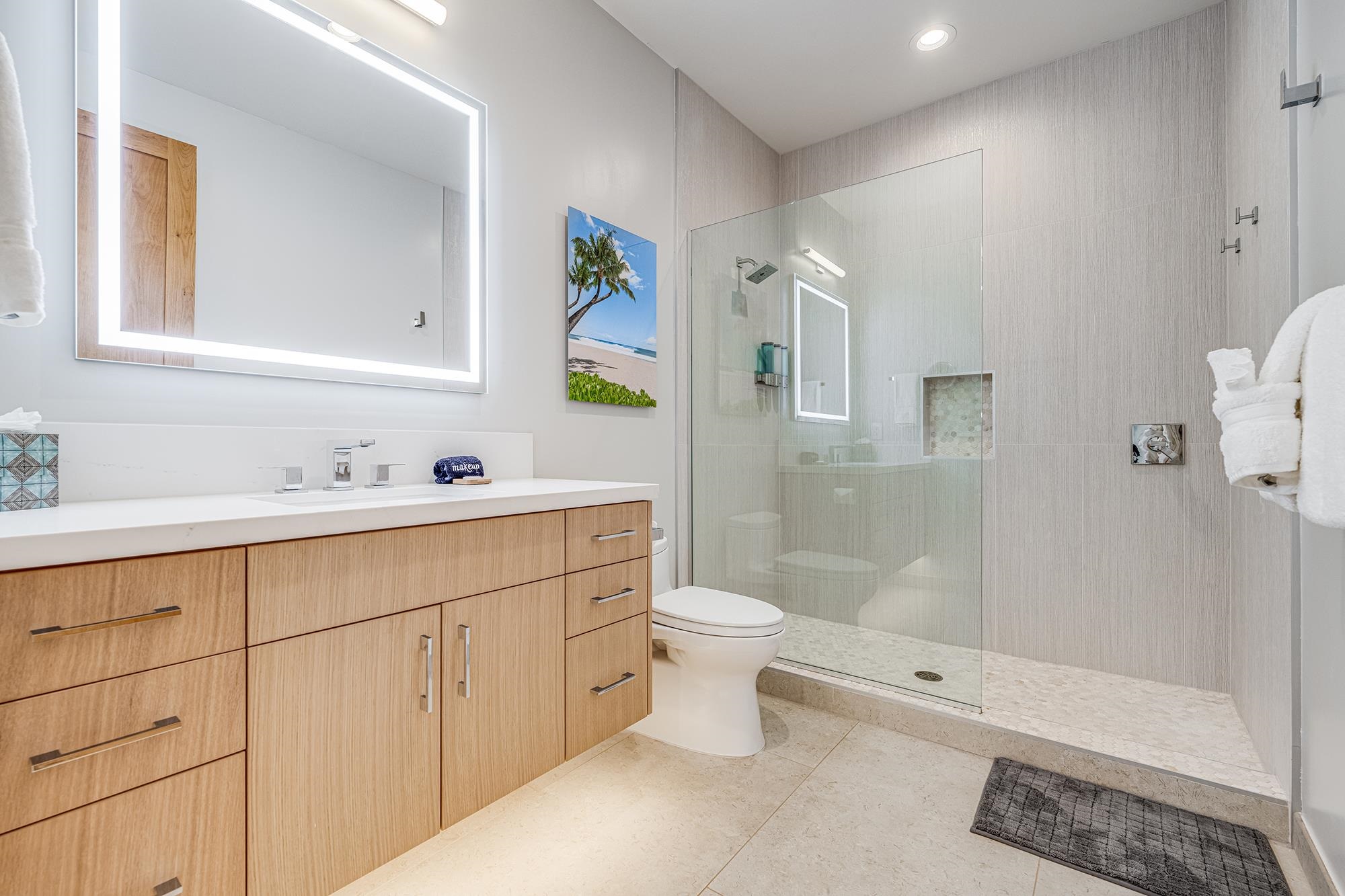 5385 Lower Honoapiilani Road Lahaina, HI 96761 - Photo 25 of 42 a bathroom with a sink toilet and shower