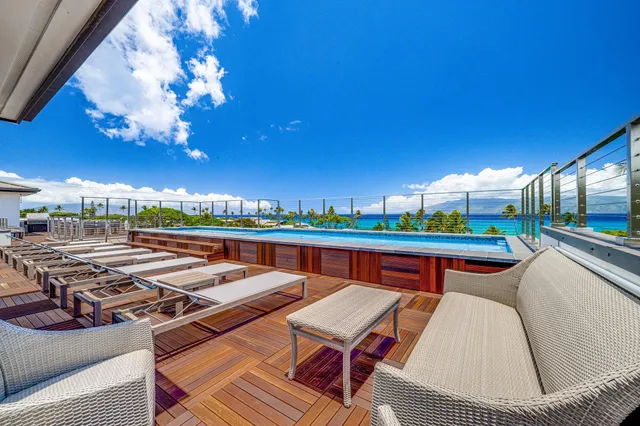 a view of a terrace with furniture