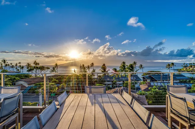 a view of a balcony with wooden floor