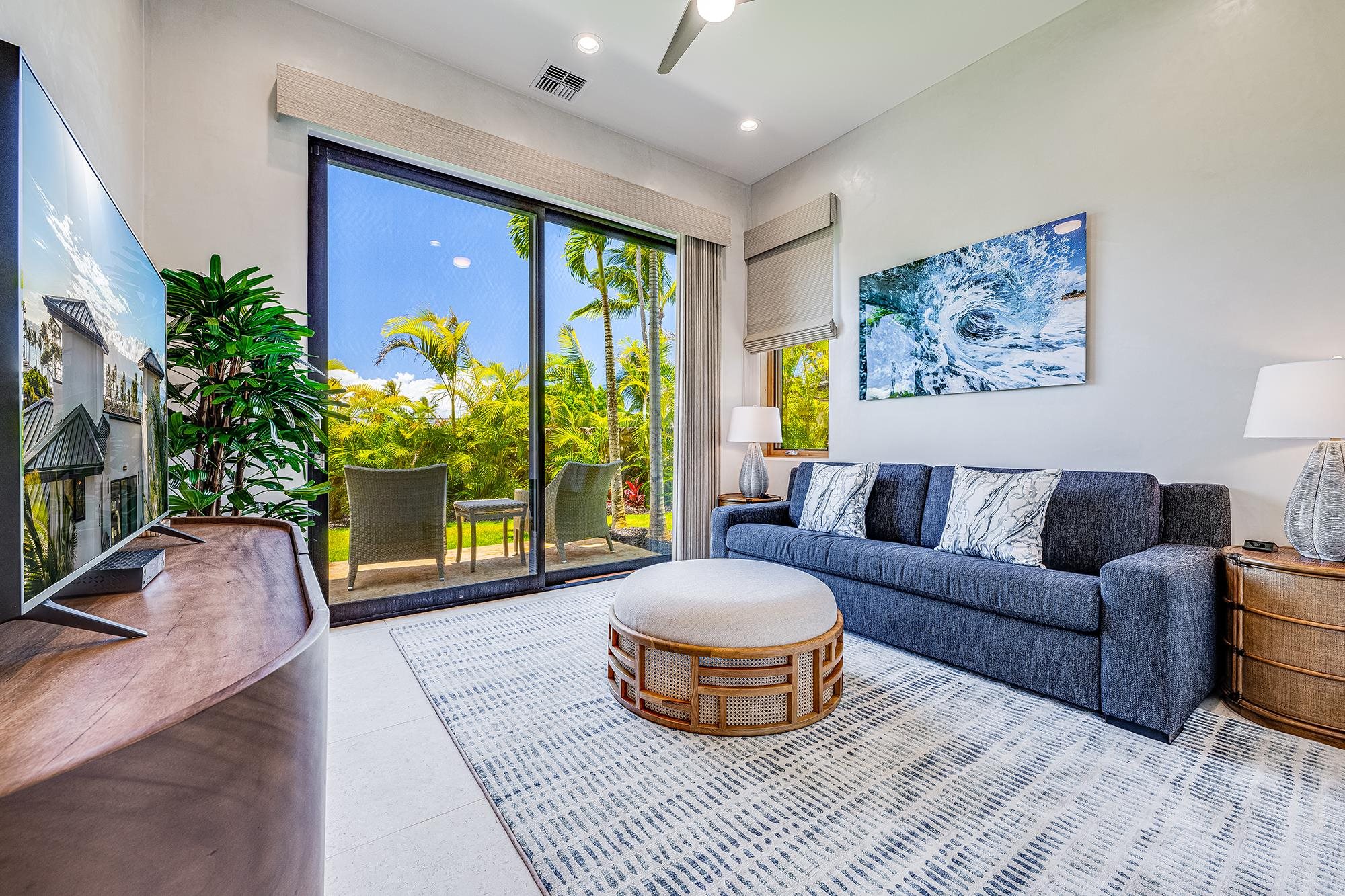 5385 Lower Honoapiilani Road Lahaina, HI 96761 - Photo 9 of 42 a living room with furniture and a potted plant