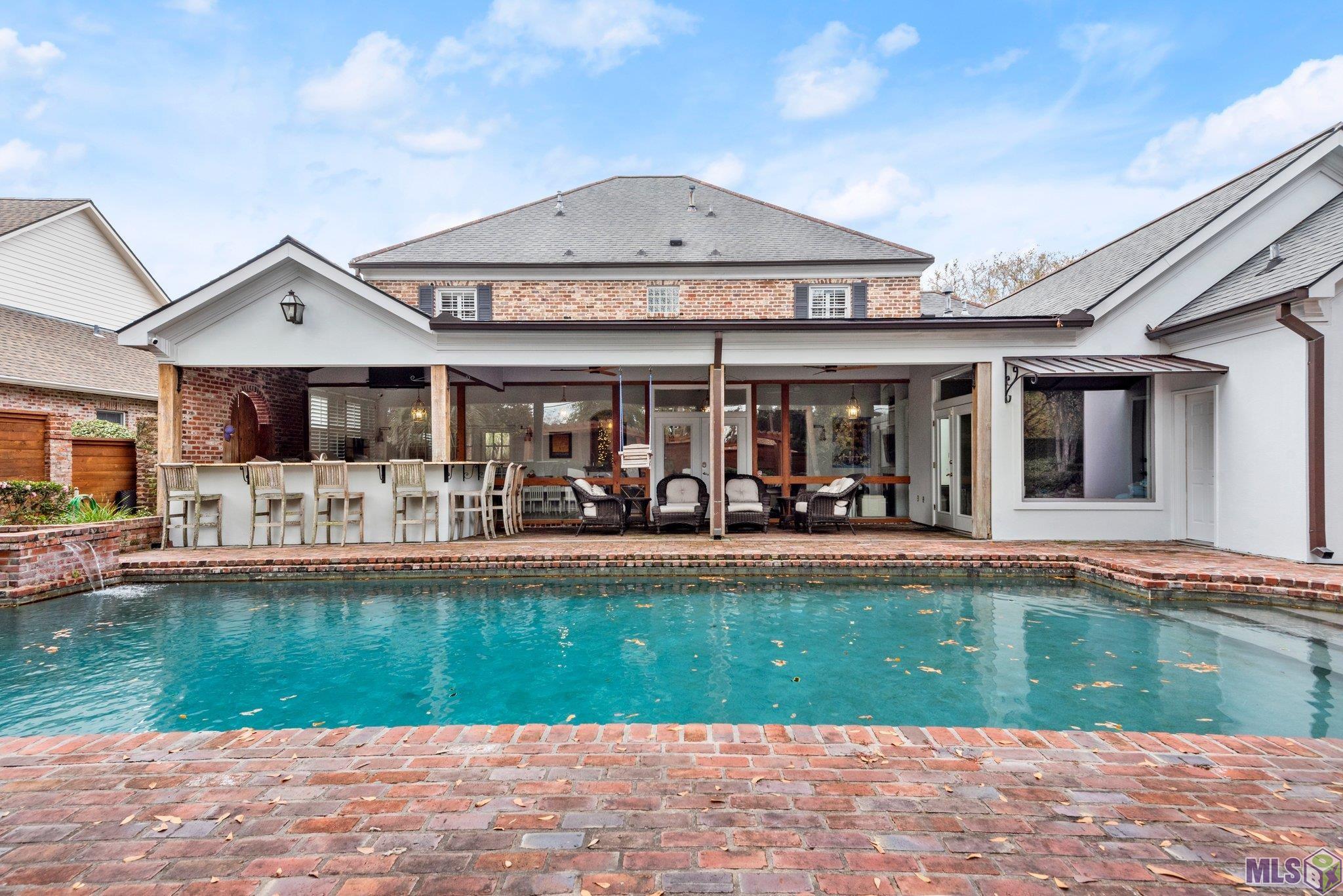 2125 Rue Bienvenue Baton Rouge, LA 70809 - Photo 30 of 37 Beautiful saltwater pool with outdoor kitchen