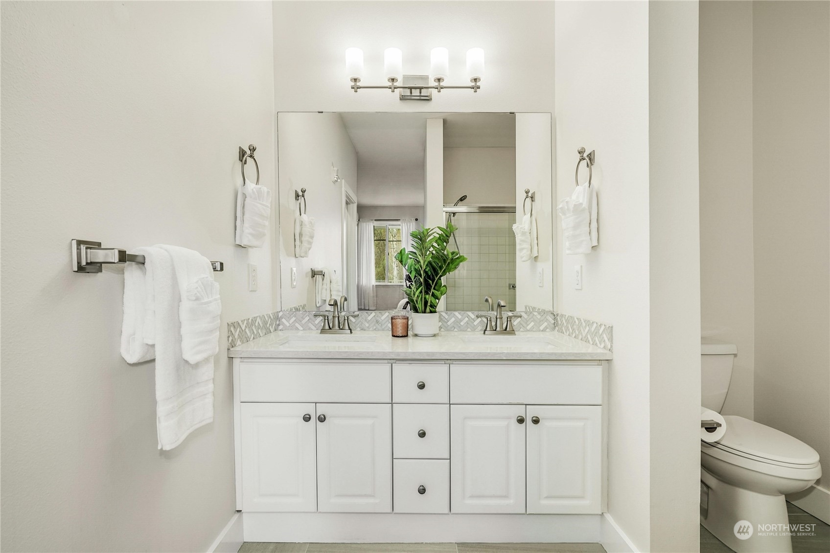 17426 Bothell Way Northeast, Unit A305 Bothell, WA 98011 - Photo 19 of 38 a bathroom with a sink vanity granite and a toilet