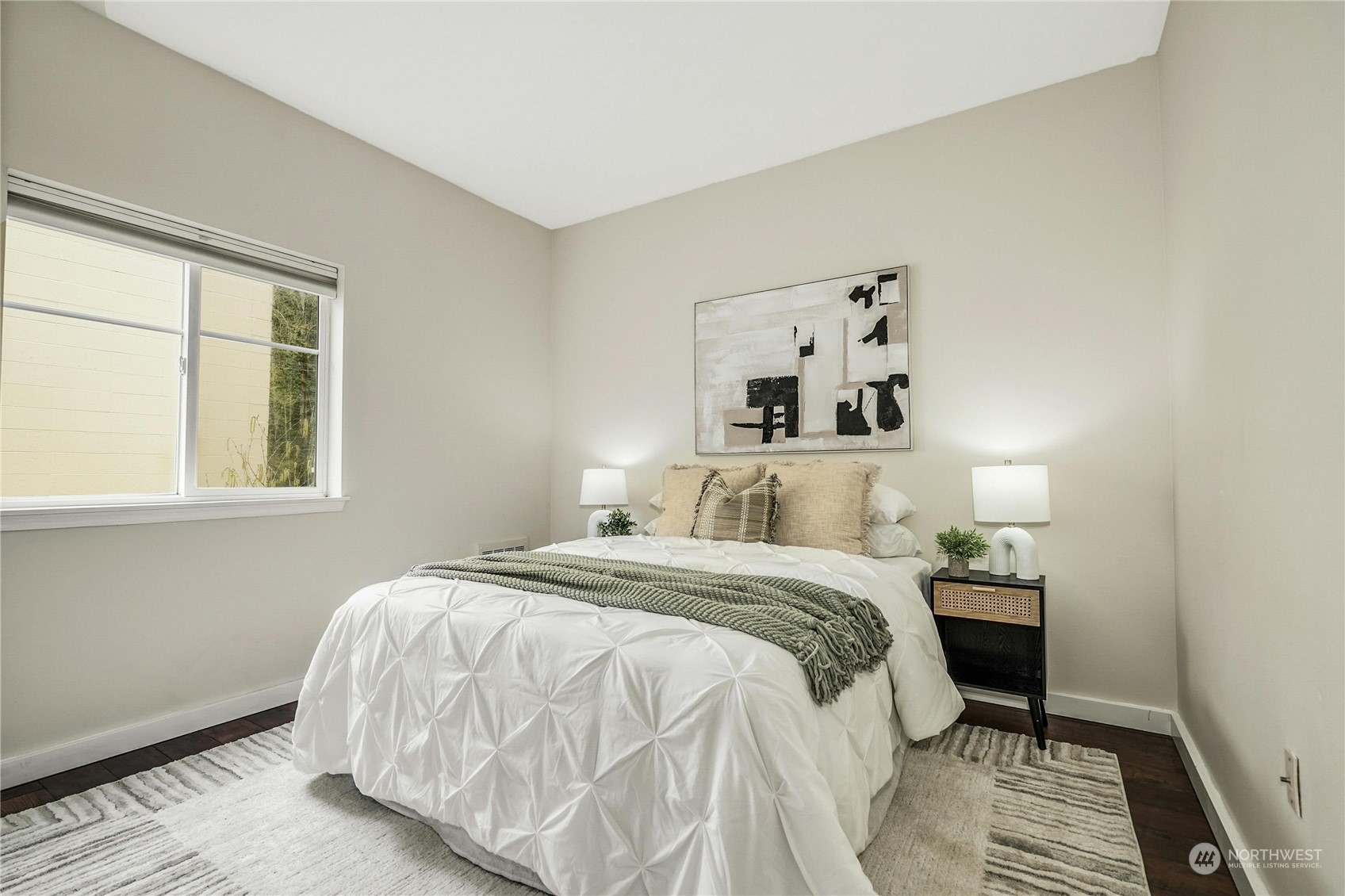 17426 Bothell Way Northeast, Unit A305 Bothell, WA 98011 - Photo 22 of 38 a bedroom with a bed and a window