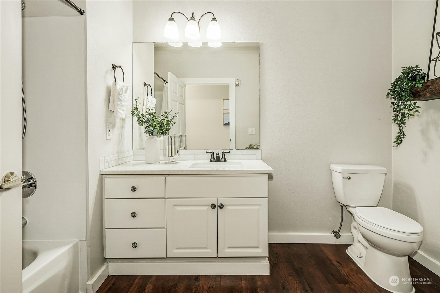 17426 Bothell Way Northeast, Unit A305 Bothell, WA 98011 - Photo 23 of 38 a bathroom with a sink toilet and shower