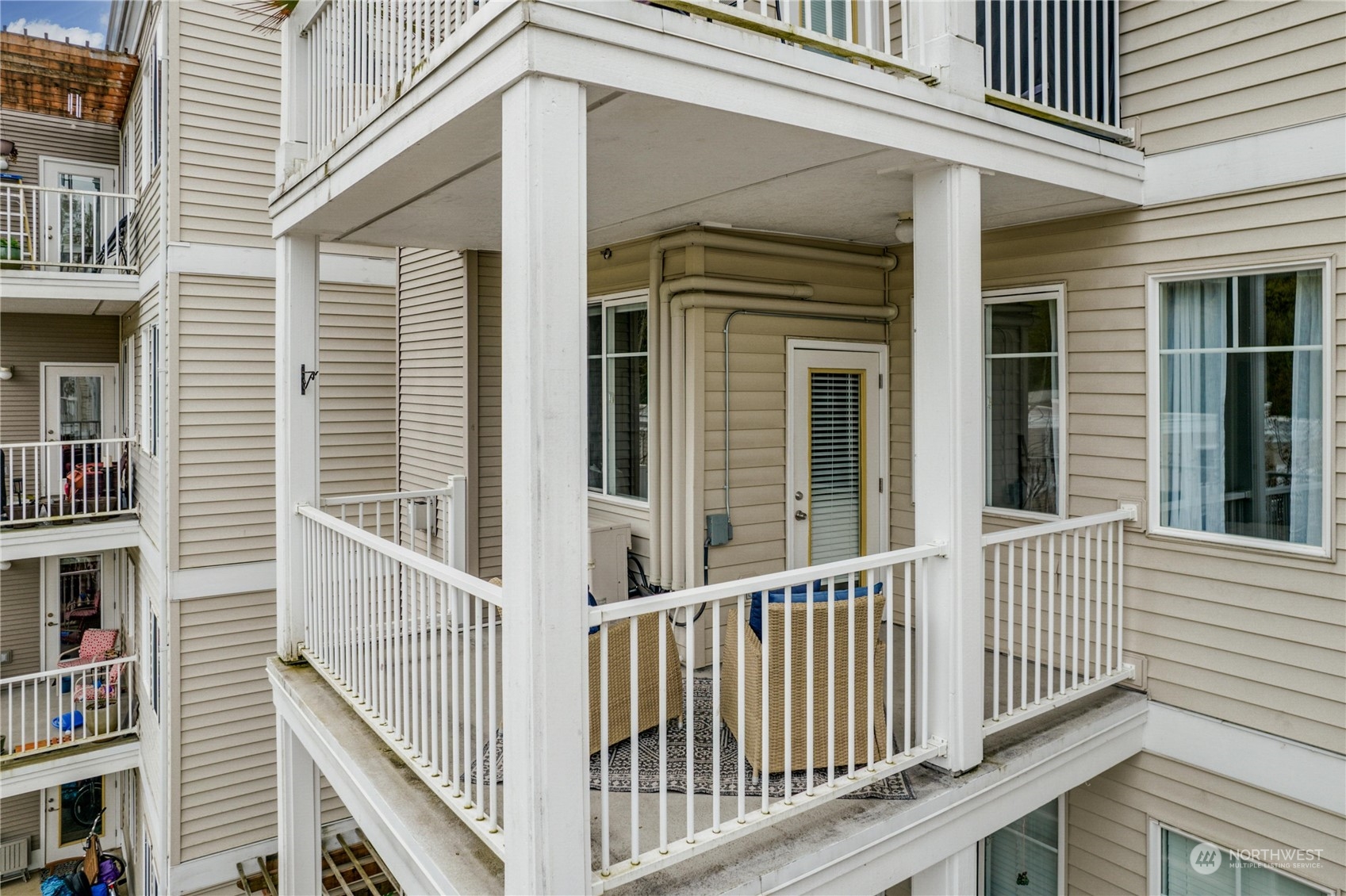17426 Bothell Way Northeast, Unit A305 Bothell, WA 98011 - Photo 31 of 38 a view of a house with a deck