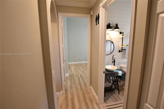 a bathroom with a tub and shower