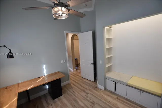 a bathroom with a double vanity sink a toilet and a mirror