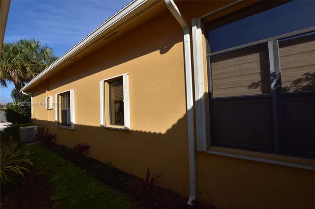 a large room with lots of chairs and mirrors