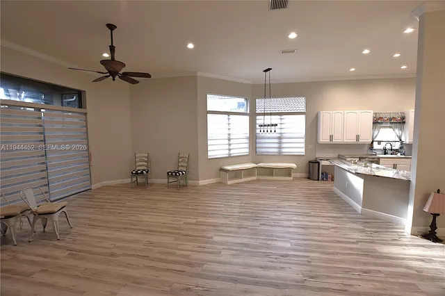 a bathroom with a toilet sink and shower