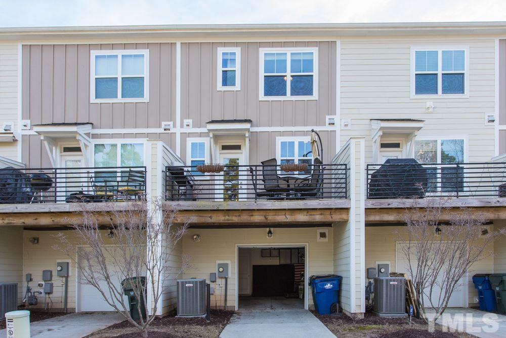 1619 Crafton Way Raleigh, NC 27607 - Photo 5 of 25 a view of a building with a balcony
