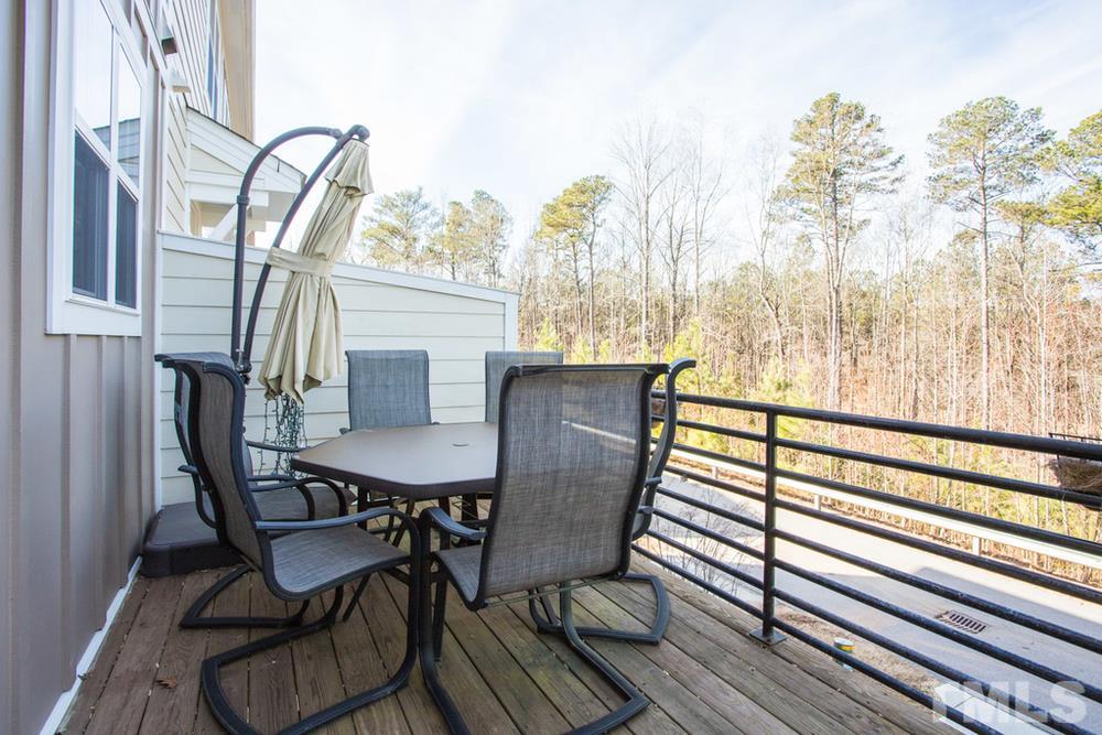 1619 Crafton Way Raleigh, NC 27607 - Photo 6 of 25 a view of a chairs on the roof deck