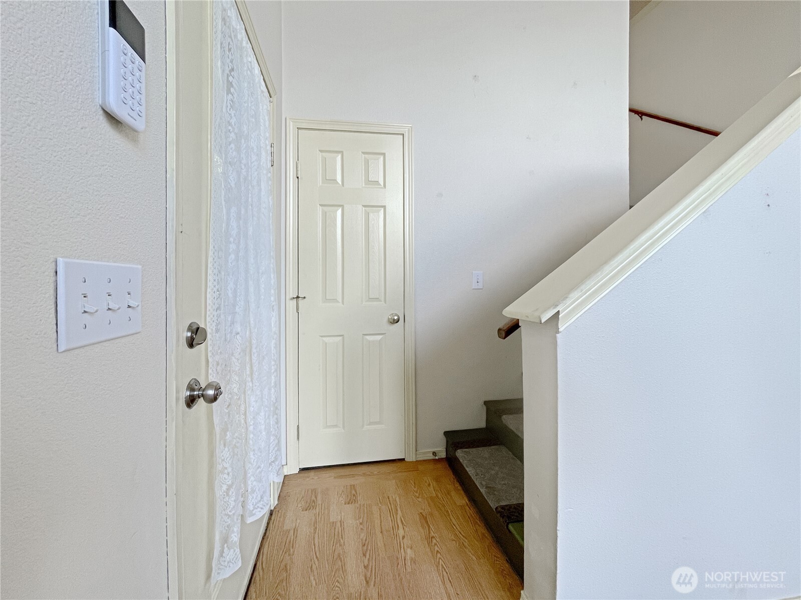 11 North Hamma Ridge Drive Lilliwaup, WA 98555 - Photo 12 of 40 a view of a hallway with closet and a couch