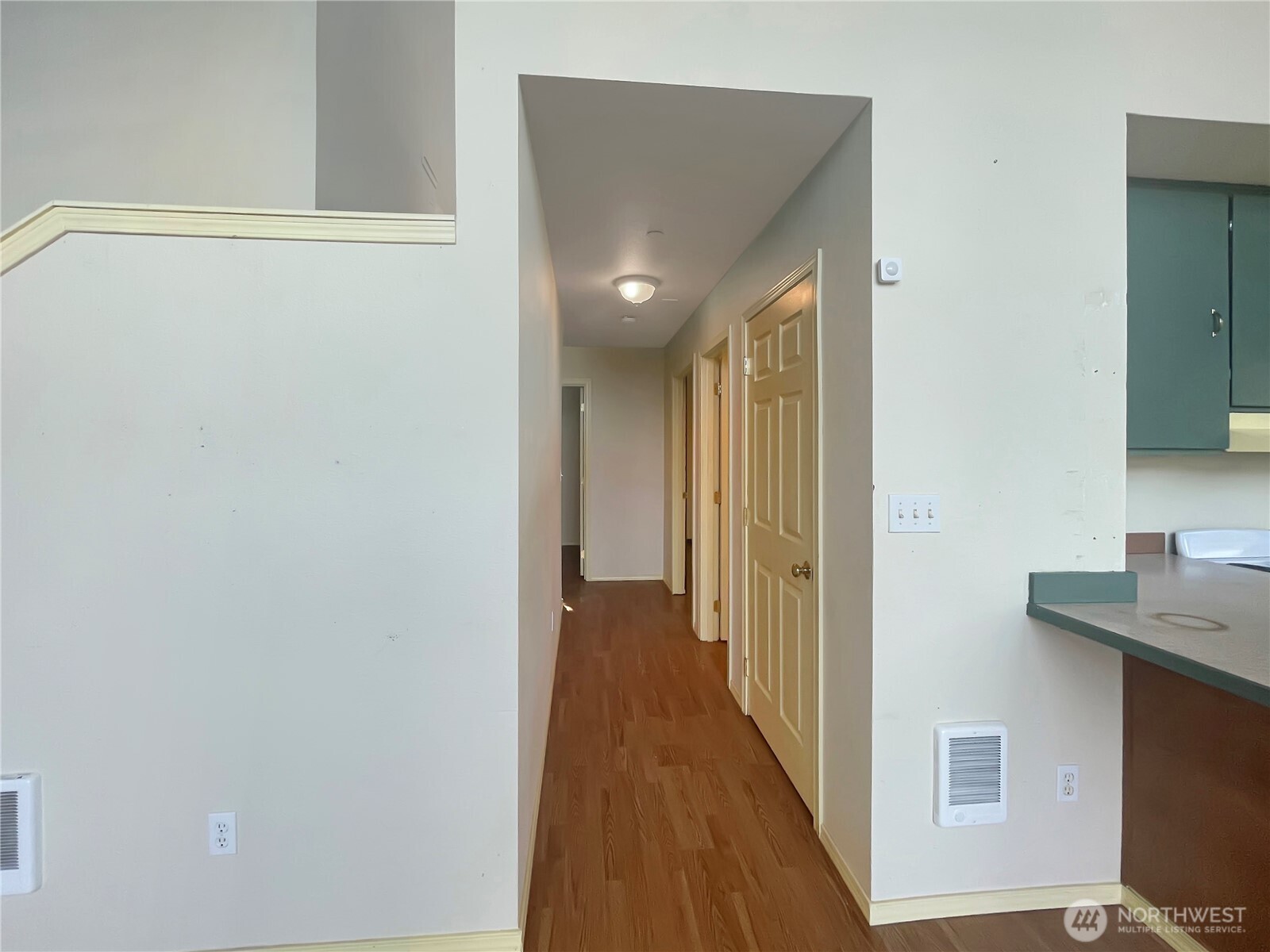 11 North Hamma Ridge Drive Lilliwaup, WA 98555 - Photo 13 of 40 a view of a hallway with wooden floor and closet