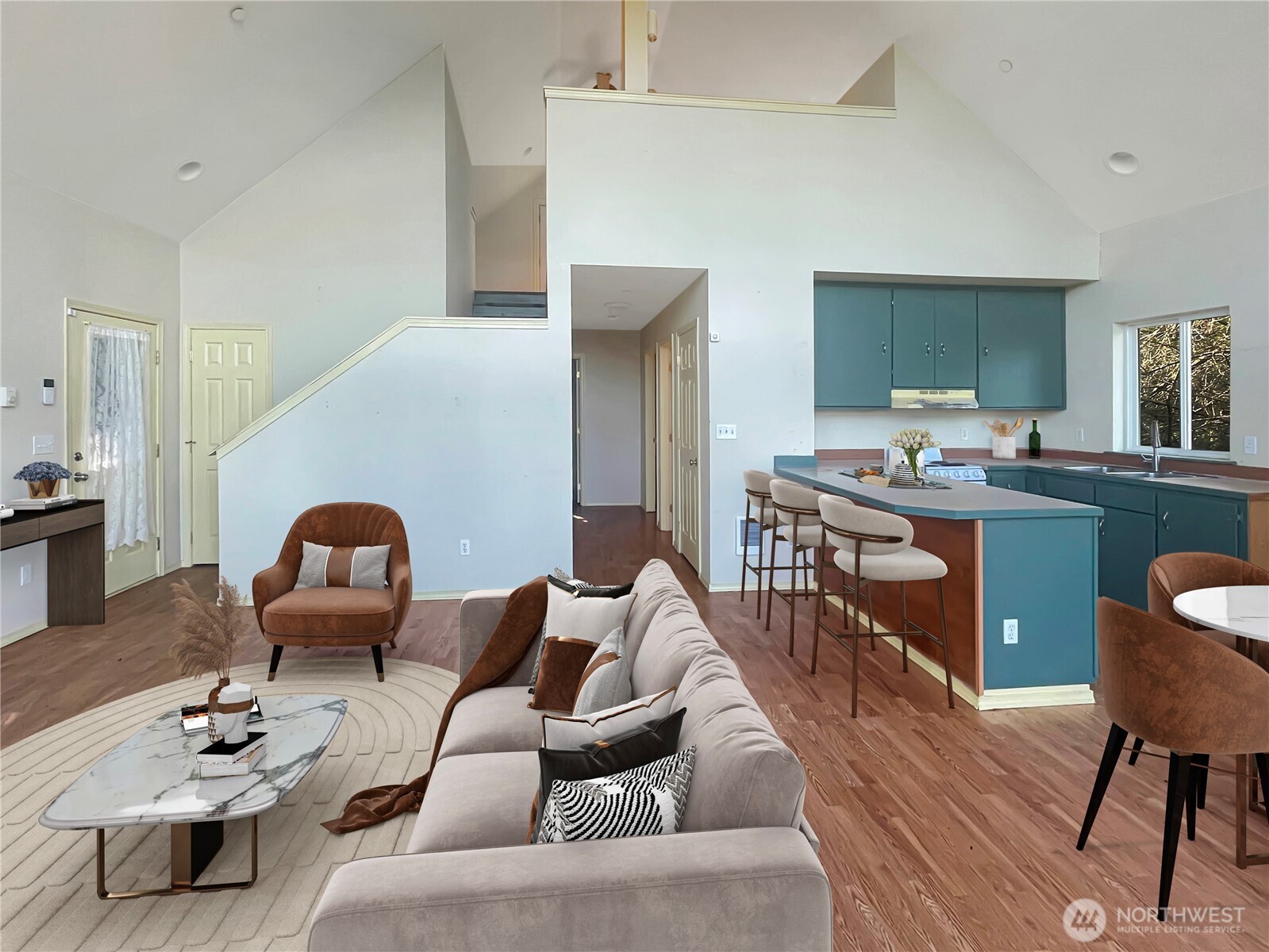 11 North Hamma Ridge Drive Lilliwaup, WA 98555 - Photo 17 of 40 a living room with furniture and wooden floor