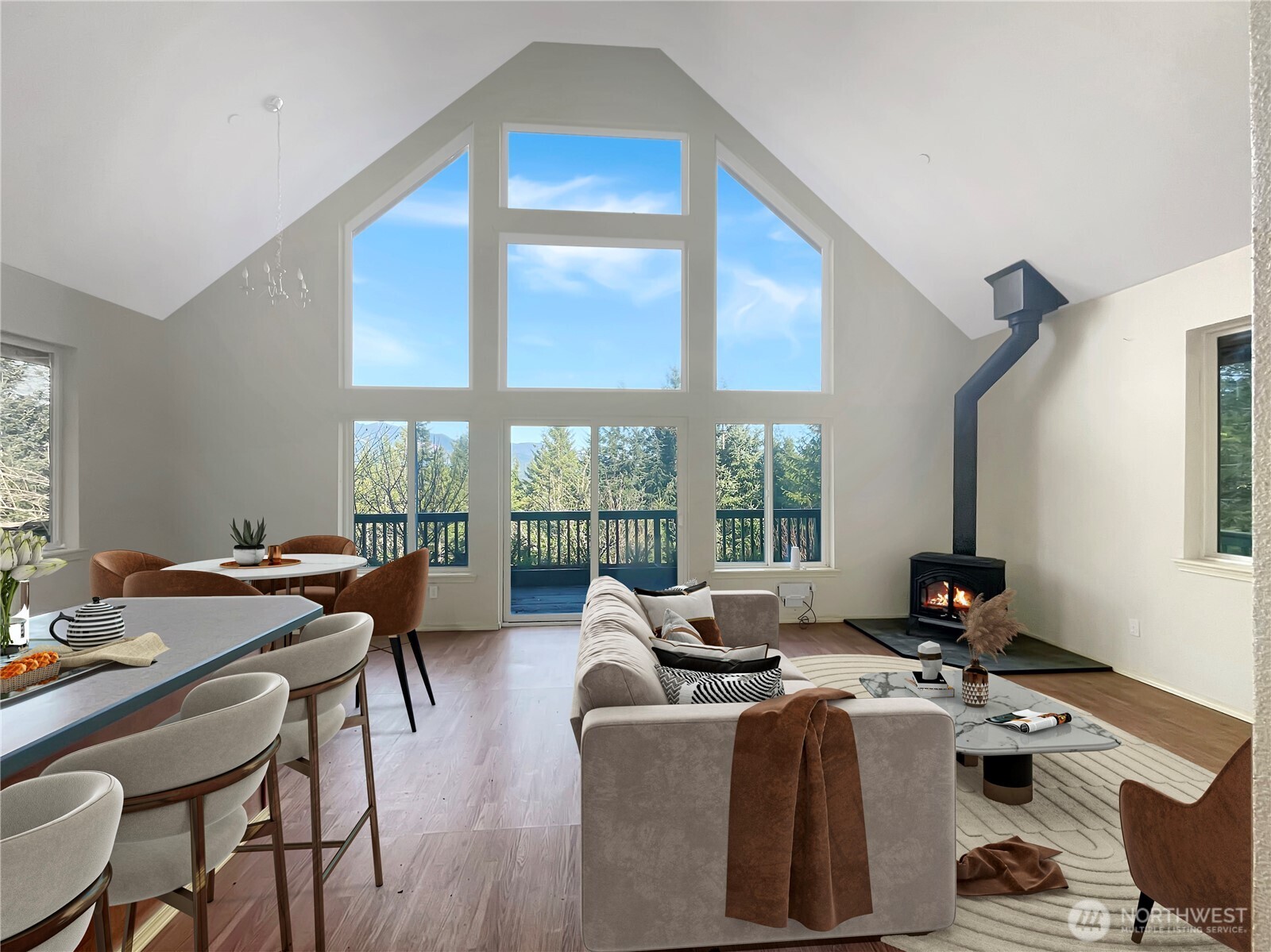 11 North Hamma Ridge Drive Lilliwaup, WA 98555 - Photo 21 of 40 a workspace with furniture large windows and wooden floor