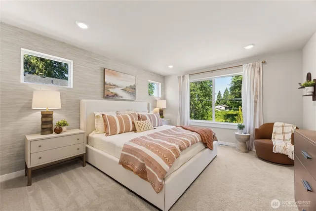 a bed room with a bed and a couch