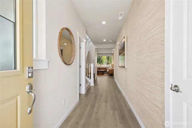 a view of a bedroom from a hallway