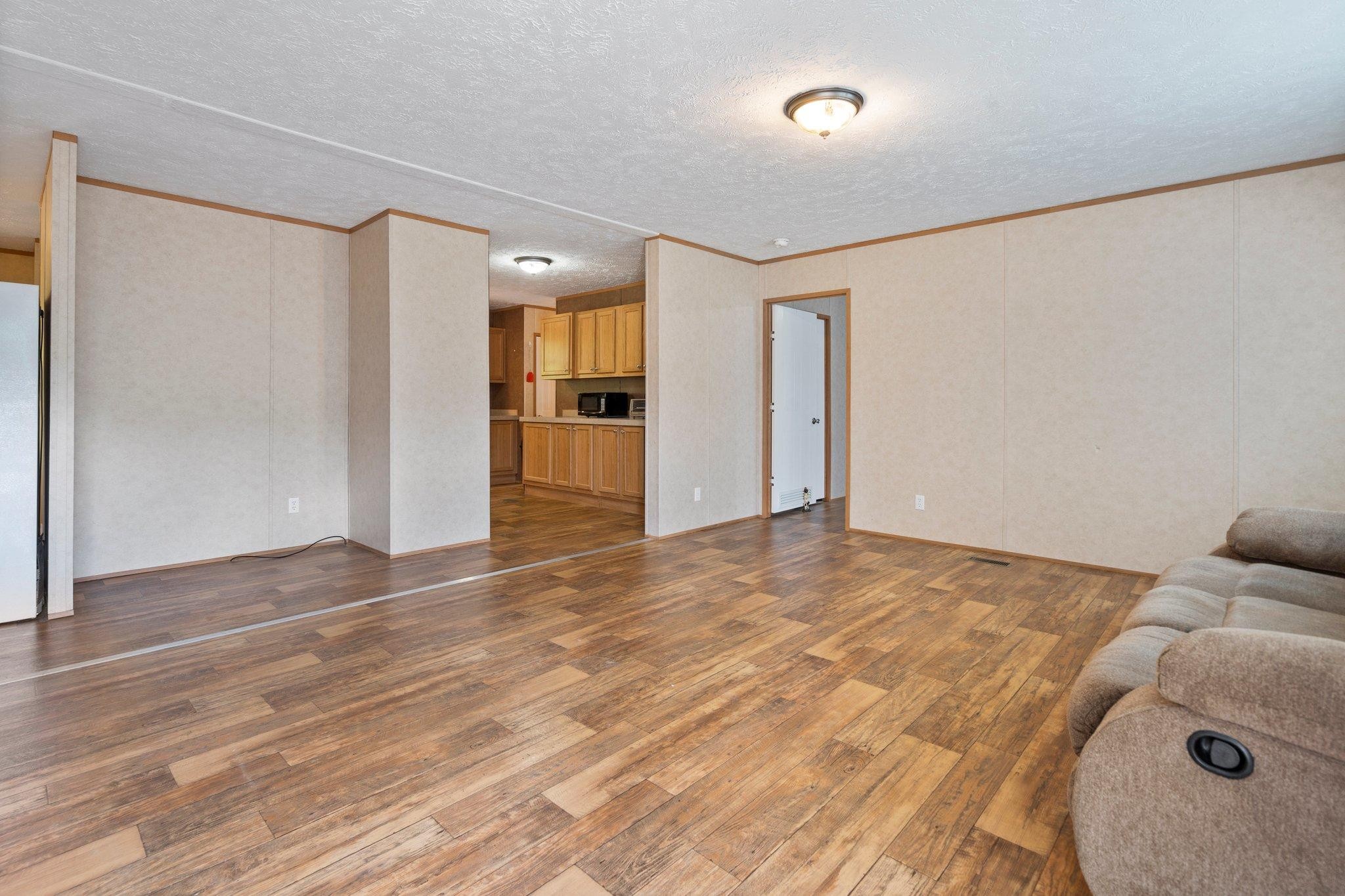 171 Buckner Road Philadelphia, TN 37846 - Photo 12 of 27 a view of empty room with wooden floor