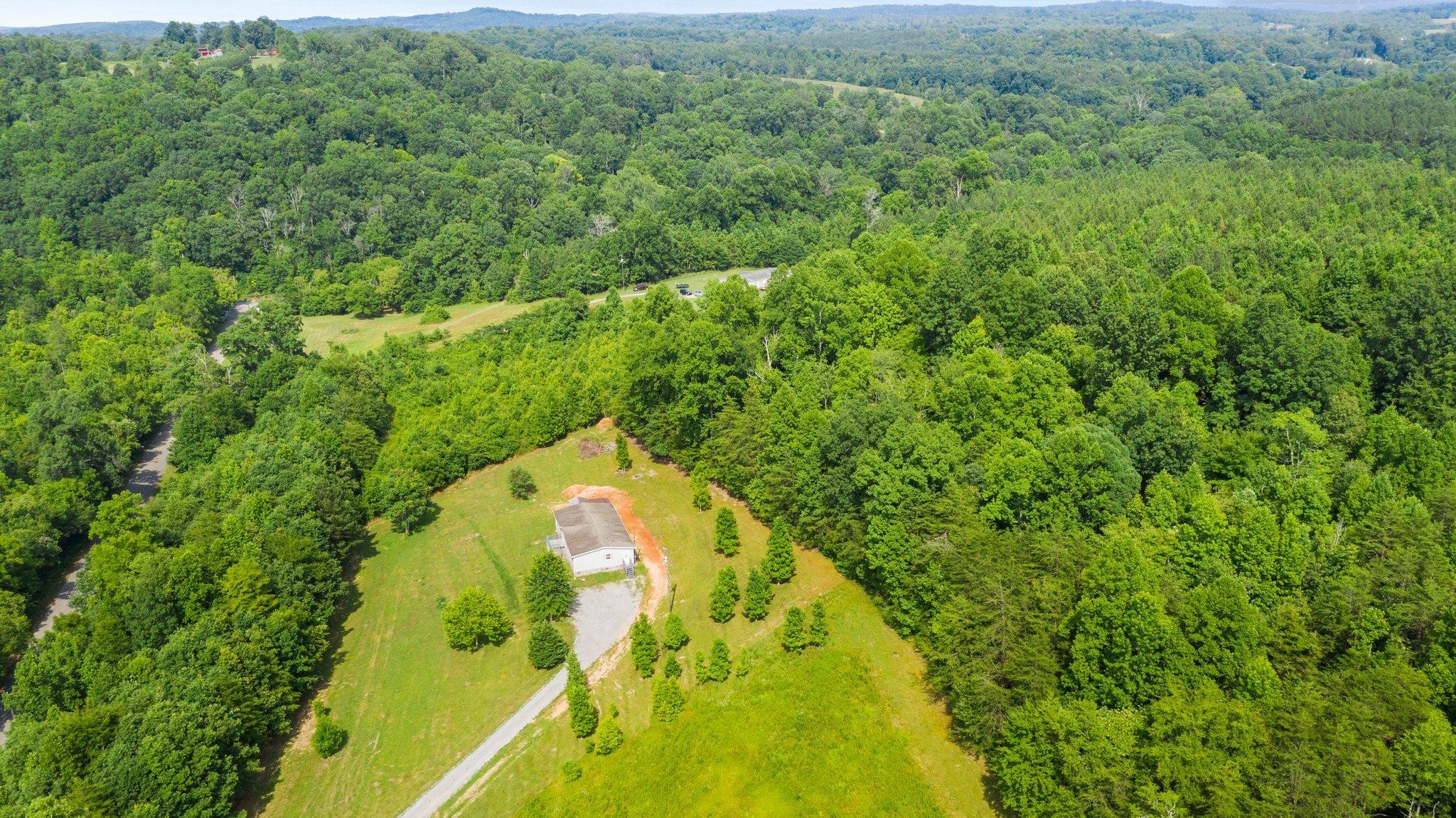 171 Buckner Road Philadelphia, TN 37846 - Photo 9 of 27 a view of a garden