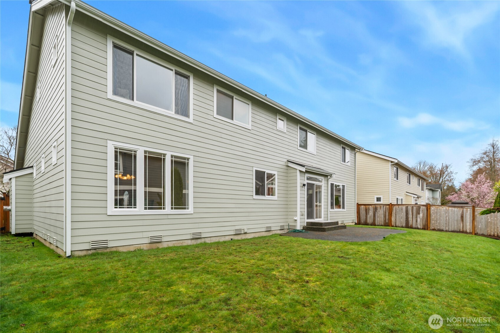 18639 175th Avenue Southeast Renton, WA 98058 - Photo 34 of 37 a front view of a house with a yard