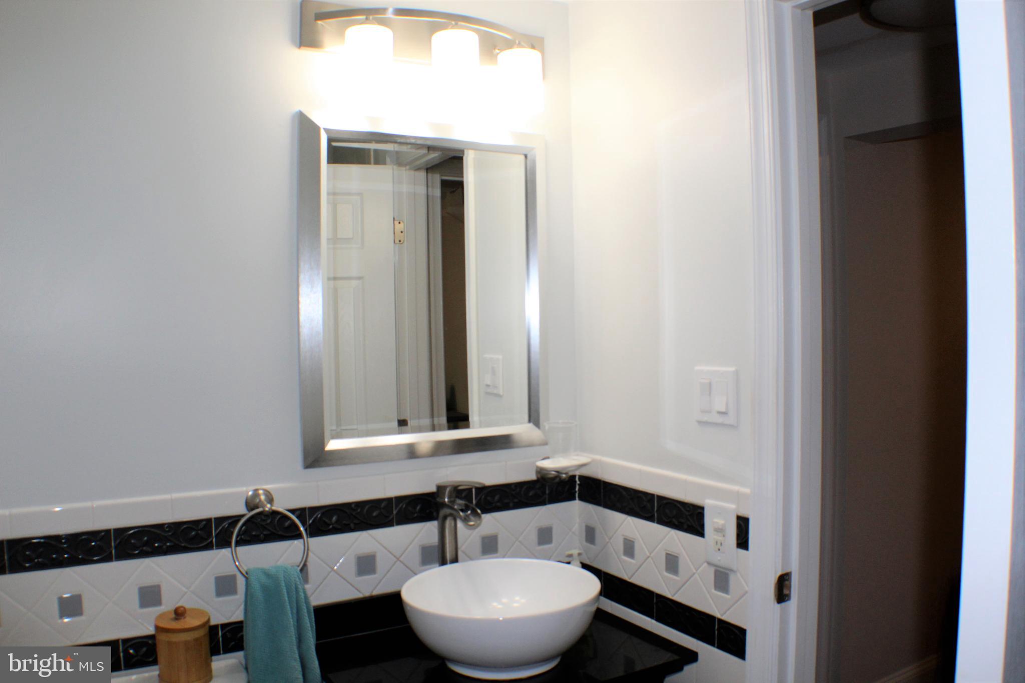 14308 Ferndale Road Woodbridge, VA 22193 - Photo 16 of 65 New vanity, sink, mirror and lighting