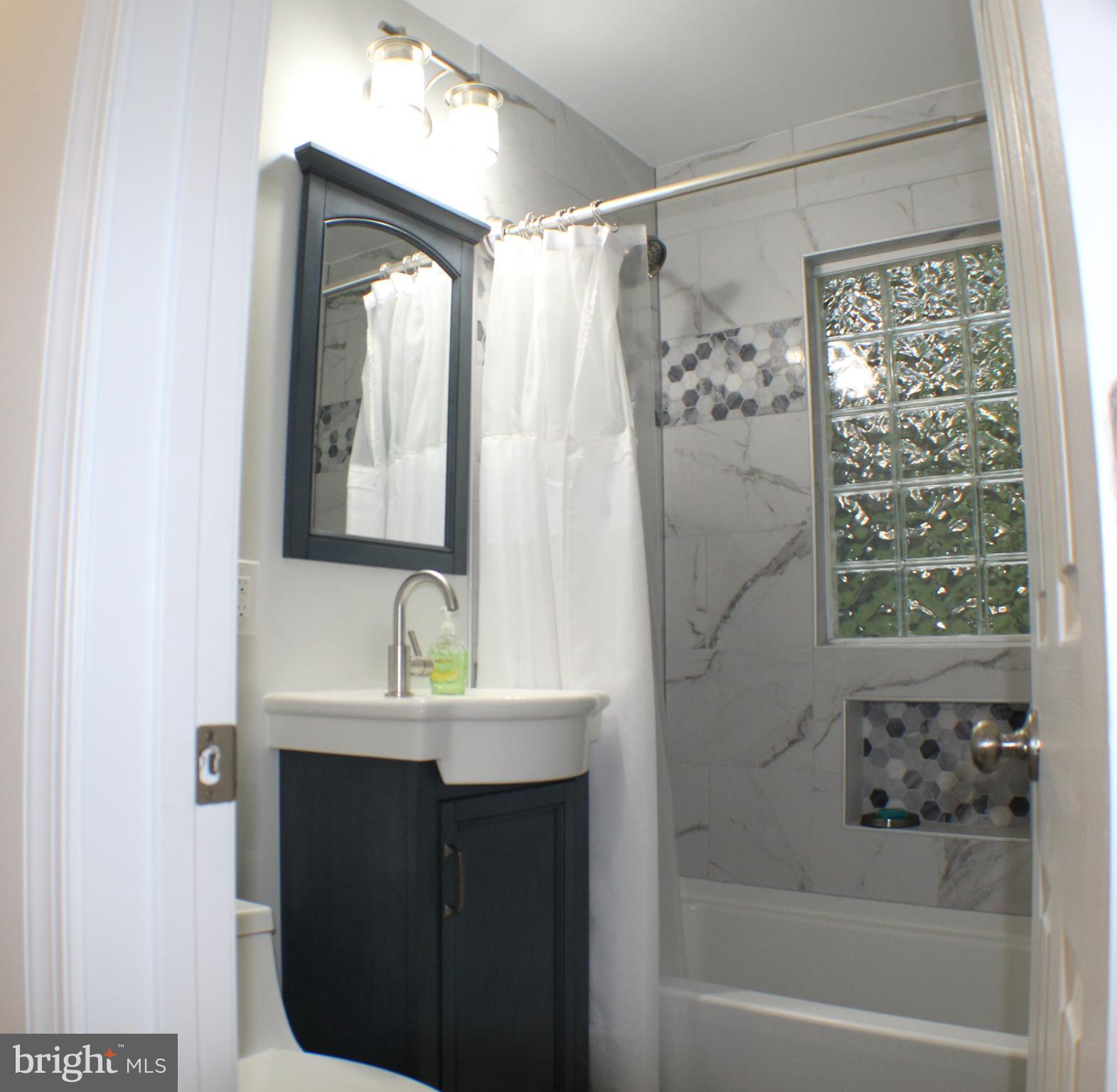 14308 Ferndale Road Woodbridge, VA 22193 - Photo 34 of 65 Beautifully renovated full bath