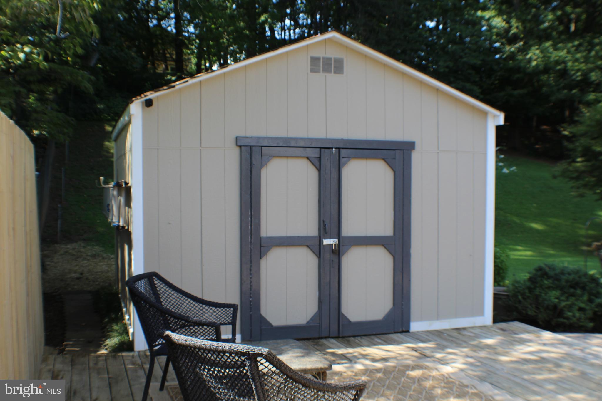 14308 Ferndale Road Woodbridge, VA 22193 - Photo 50 of 65 Large shed with shelving