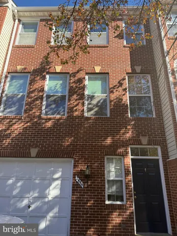 an aerial view of a residential apartment building with a door
