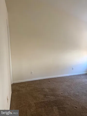 an empty room with an oven