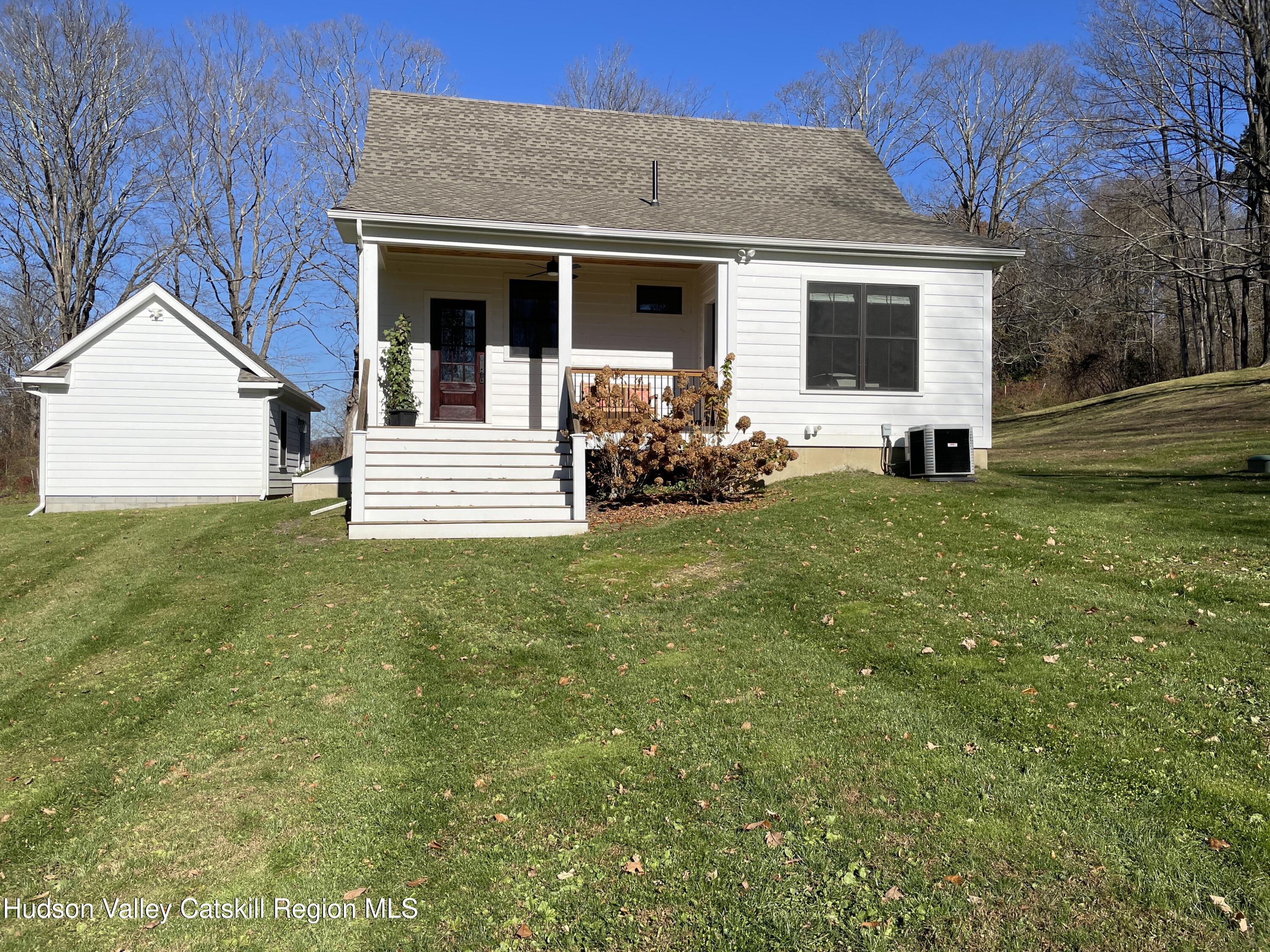 106 Beilke Road Millerton, NY 12546 - Photo 2 of 10 a view of house and yard with green space