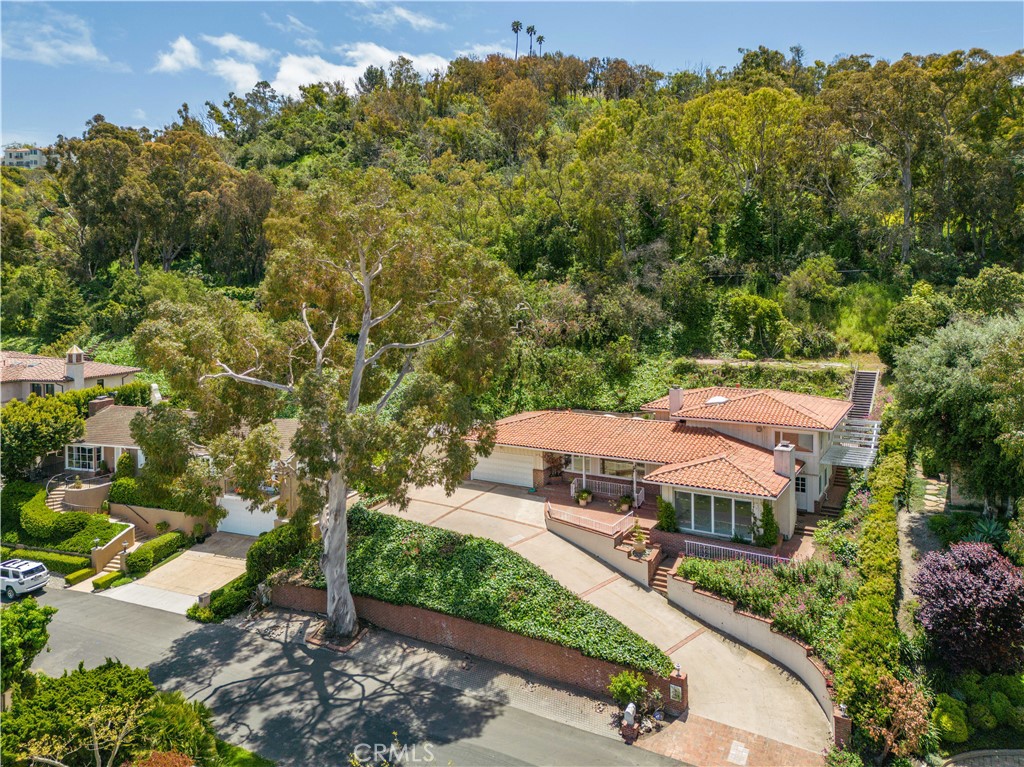 a view of a street with a houses