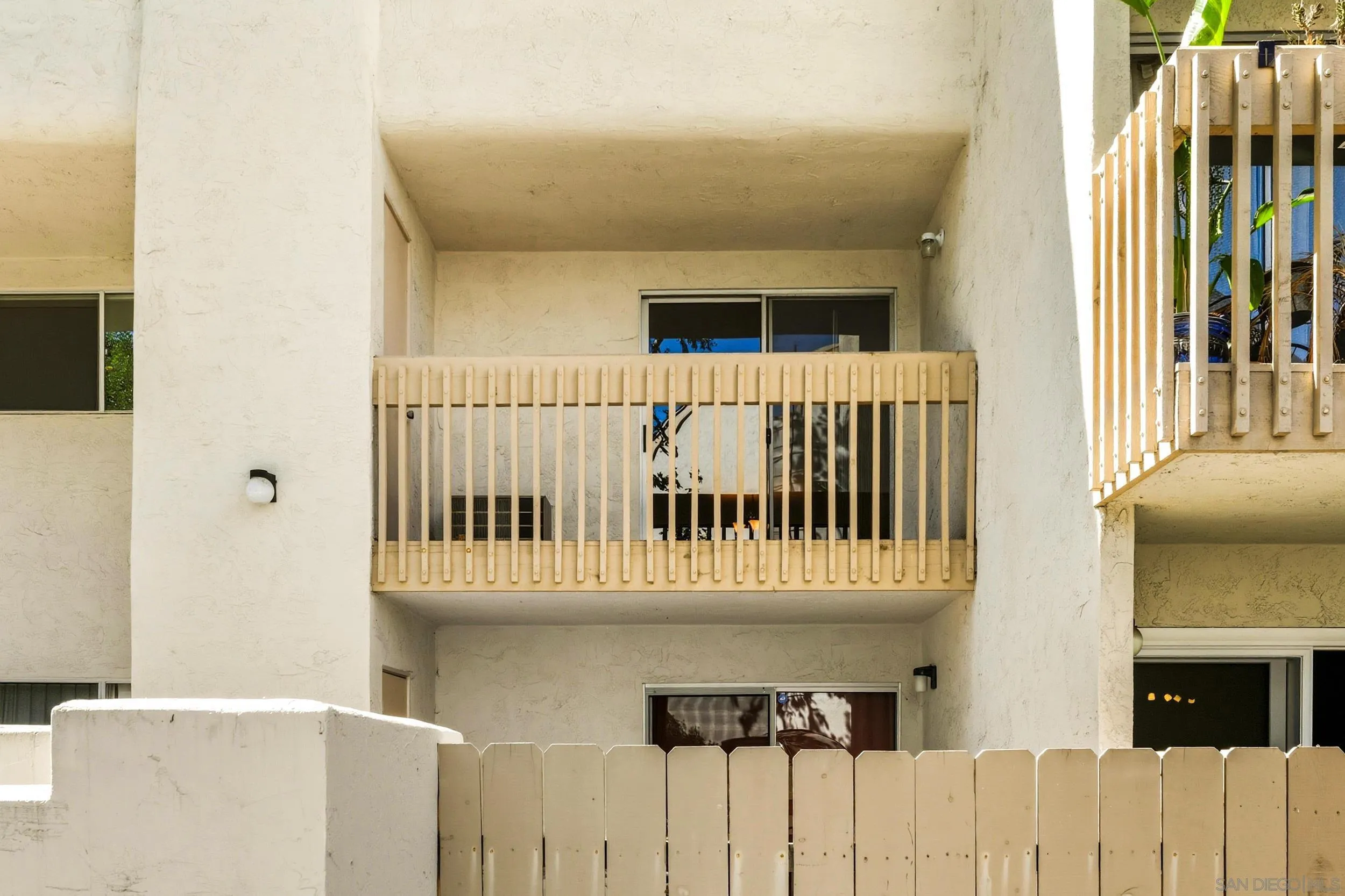 6255 Rancho Mission Road, Unit 217 San Diego, CA 92108 - Photo 16 of 23 a view of a balcony with furniture