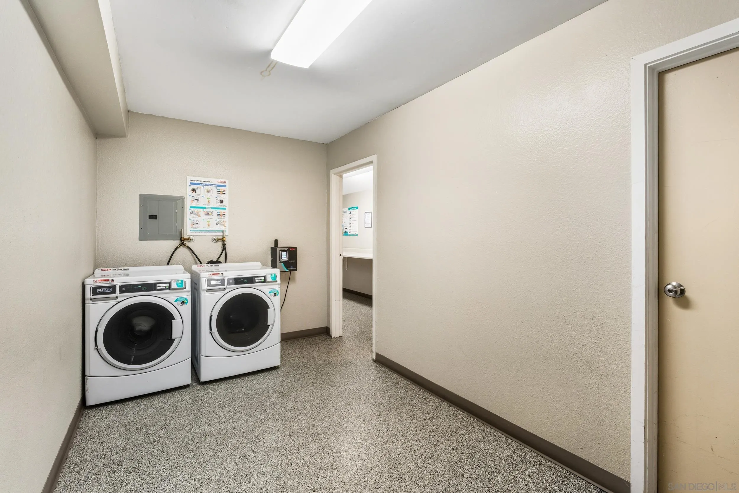6255 Rancho Mission Road, Unit 217 San Diego, CA 92108 - Photo 21 of 23 a utility room with dryer and washer